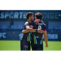 Las Vegas Lights FC's Marco Cesar Jaime Jr. (left) and Omar Salgado celebrate a goal