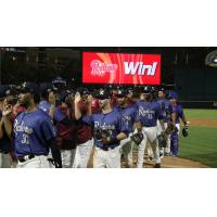 Frisco RoughRiders exchange congratulations after a win