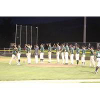 Medford Rogues line up for high fives