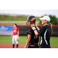 Brenna Moss of the Chicago Bandits receives congratulations on her record-tying hit